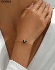 Bracelet en acier inoxydable en forme de cœur avec perles blanches véritables, plaqué or 18 carats, pour femmes