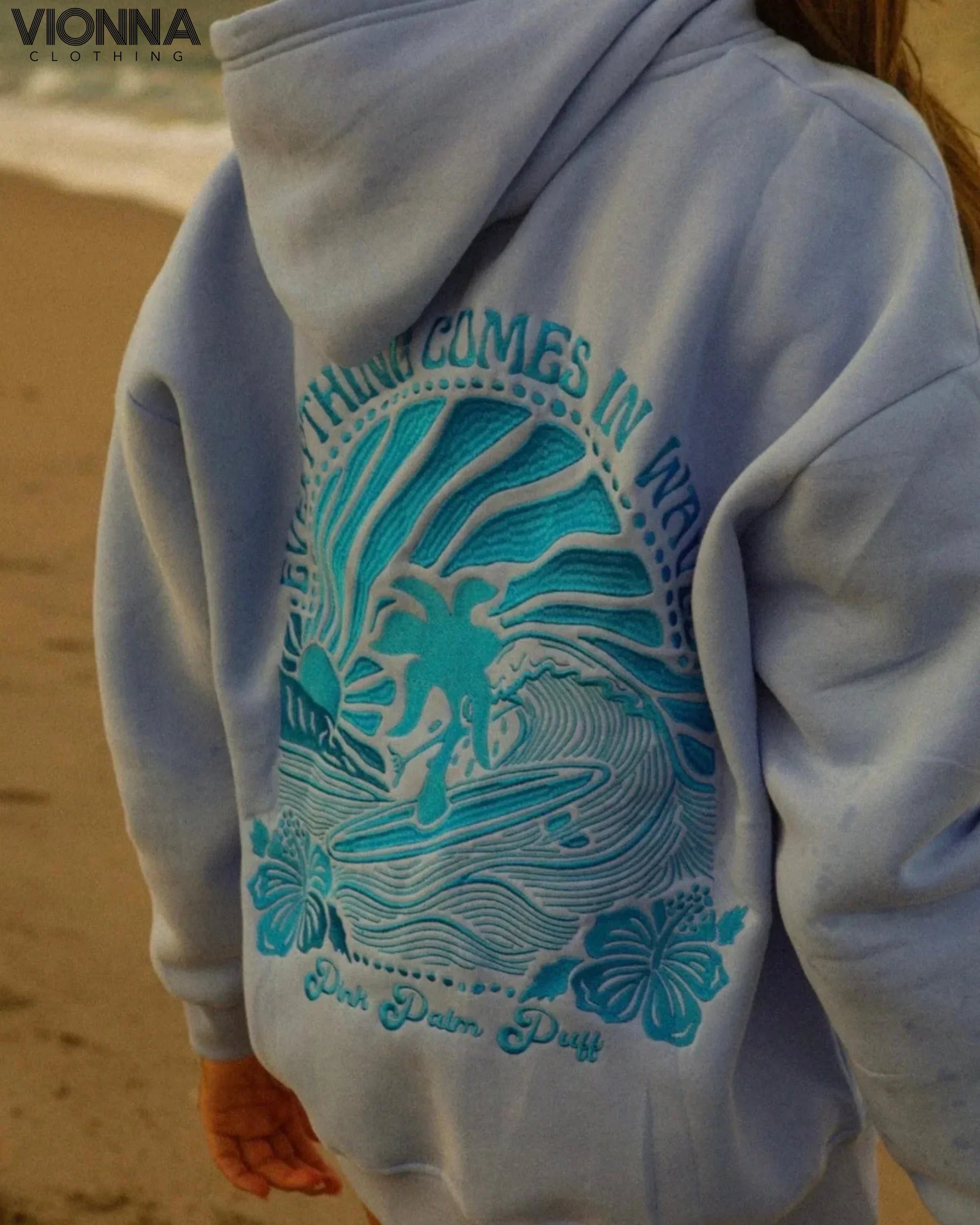 Sweat à capuche à imprimé graphique vibrant | coton confortable coloré bleu / S Vêtements et accessoires >
